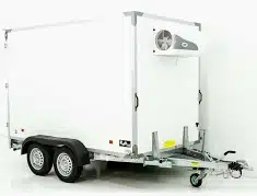 White dual-axle refrigerated cargo trailer