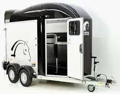 White two-horse trailer with open side door